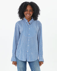 Mecca with the sleeves rolled down on the Steven Alan Tux Shirt In Blue and Cream Stripe