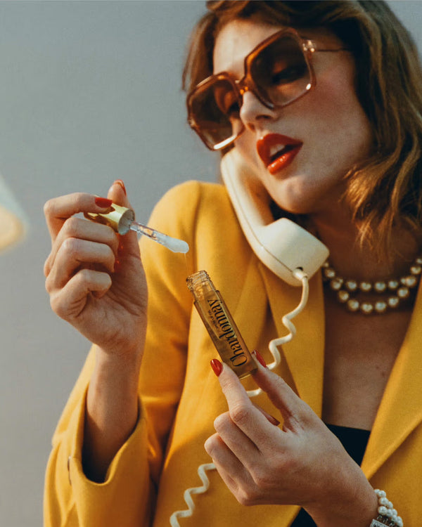 Chardonnay Lip Oil with model