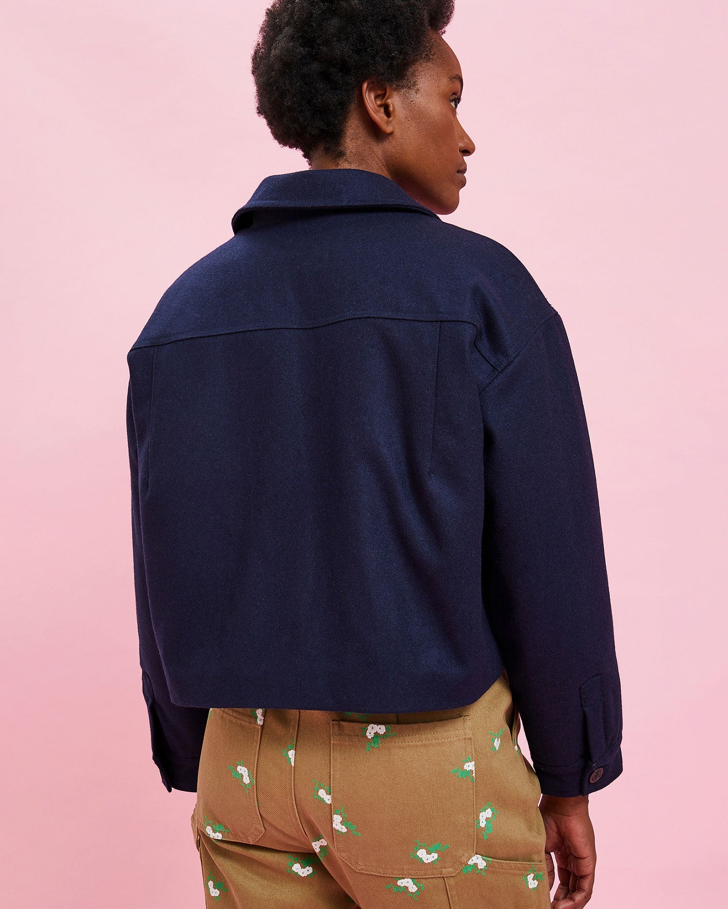 back view of the model wearing the Navy Wool Coat