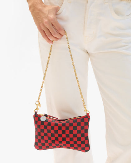 Model holding Wallet Clutch with strap