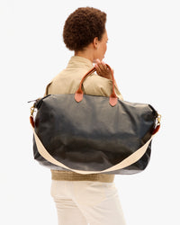 Weekender over model's back