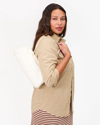Alana wears Yvette on her shoulder