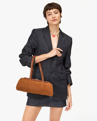 Model carrying the Hazelnut Yvette on her  arm. 