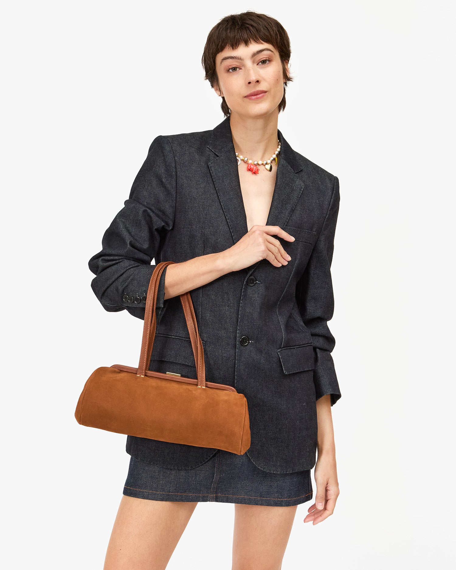 Model carrying the Hazelnut Yvette on her  arm. 