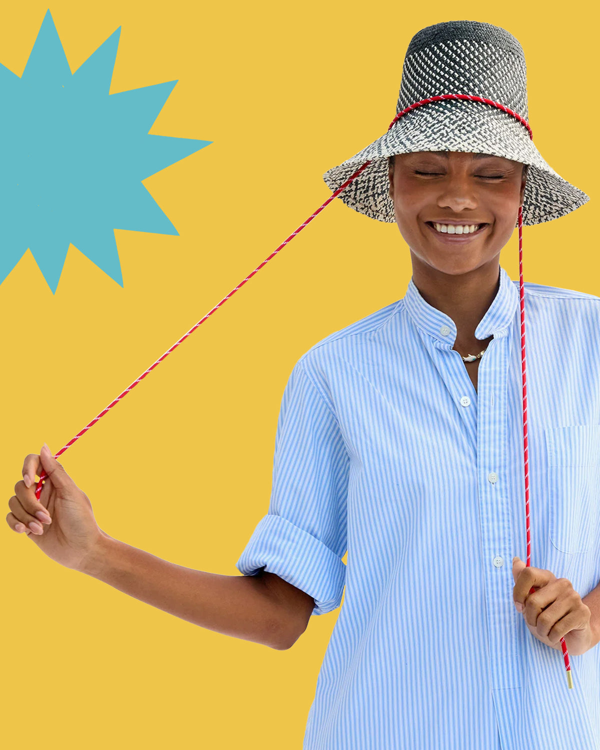 Model wearing a shirt dress with the  Black and Natural Romy Hat.
