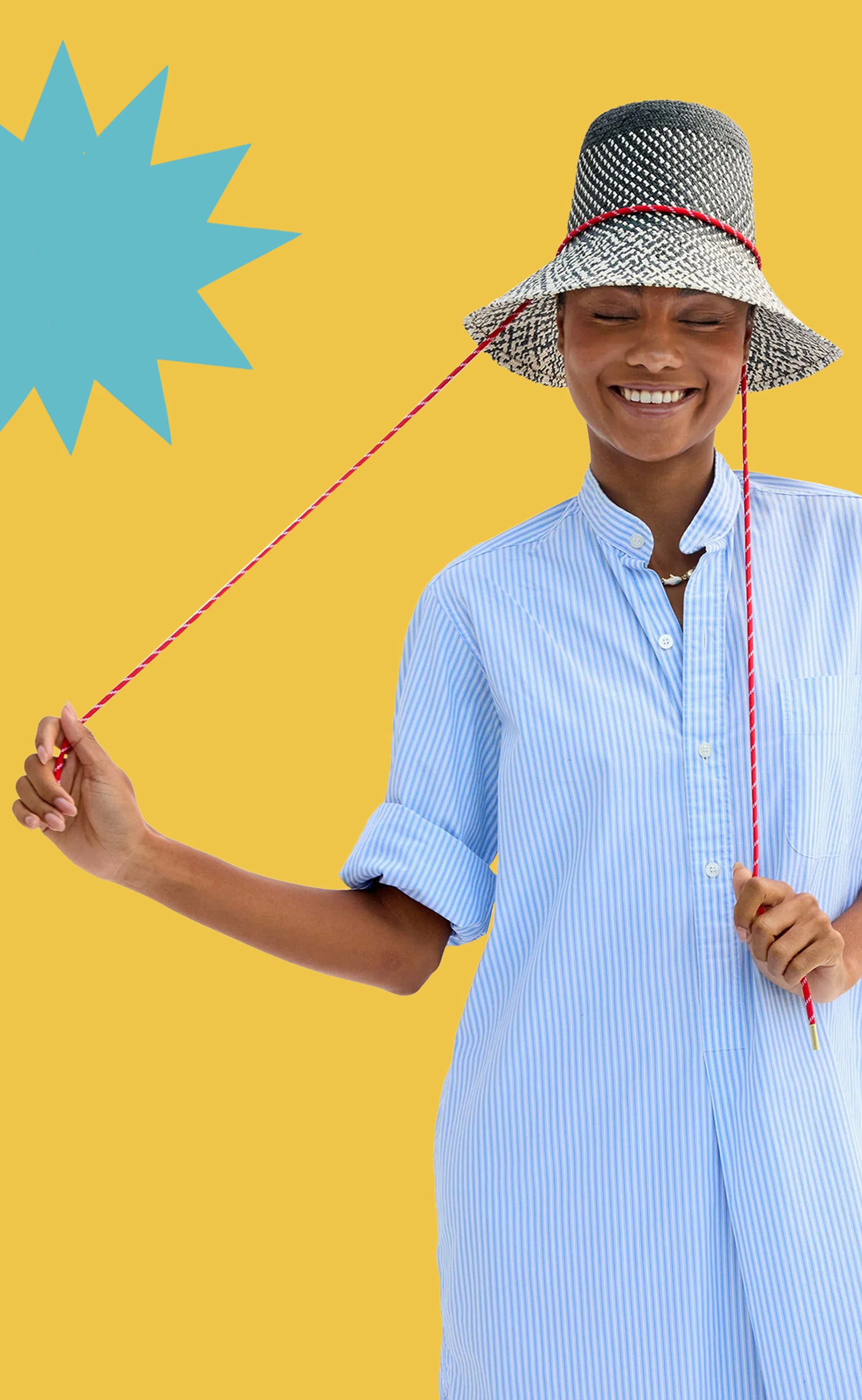 Model wearing a shirt dress with the  Black and Natural Romy Hat.