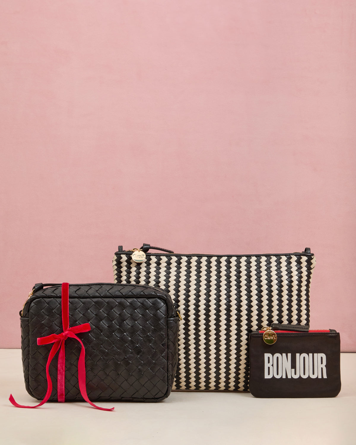 Midi Sac, Flat Clutch with Tabs, and Coin Clutch.