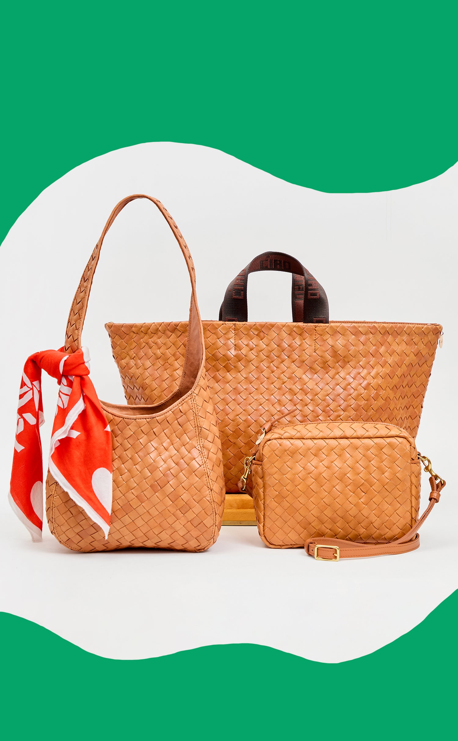 Natural Diagonal Woven Petit Bando with EMC Bandana, Natural Diagonal Woven Bateau Tote, and Natural Diagonal Woven Mid Sac.