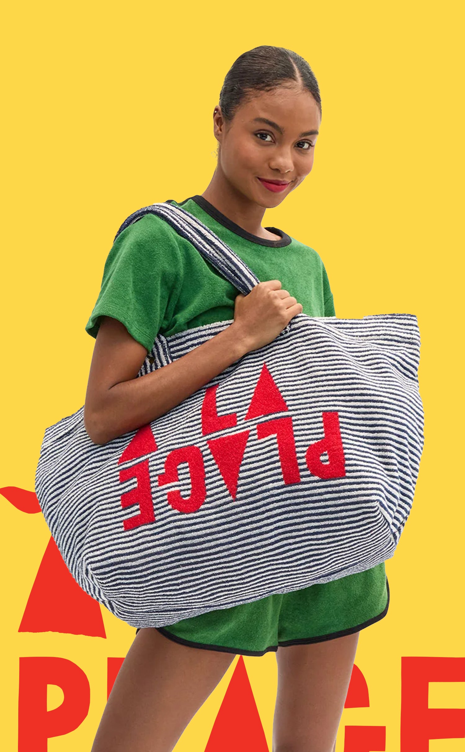 Model wearing the Olive La Plage Set and carrying the La Plage Tote.
