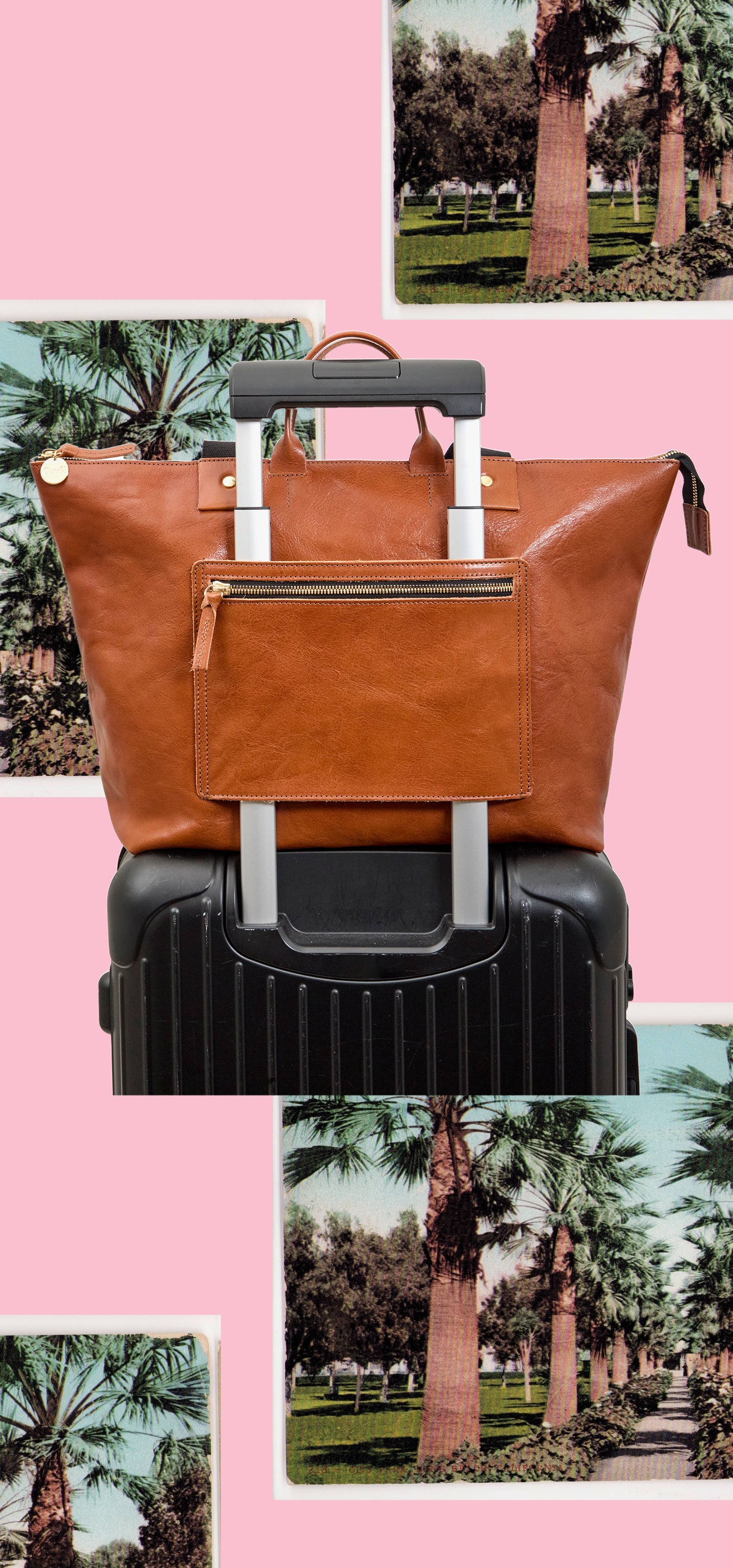 Miel Le Zip Sac with Travel Pocket over the handles of a luggage. 