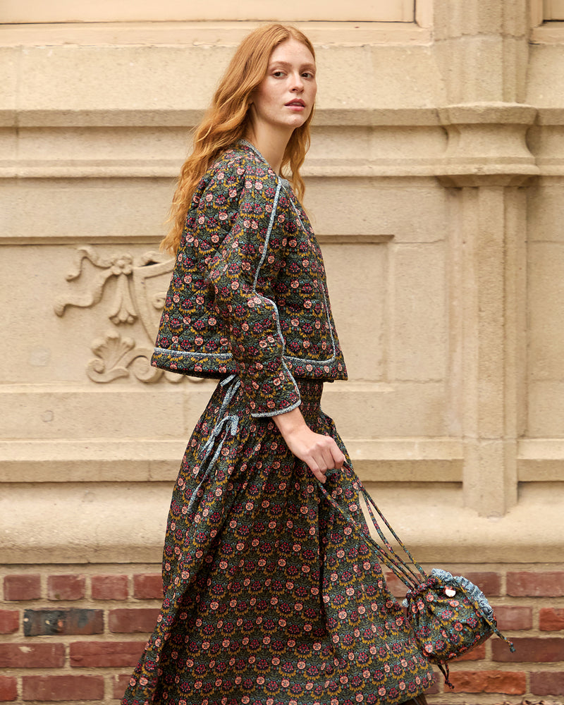 Model wearing CV x Liberty fabrics Jacket, Skirt, and Emma with Ruffle.