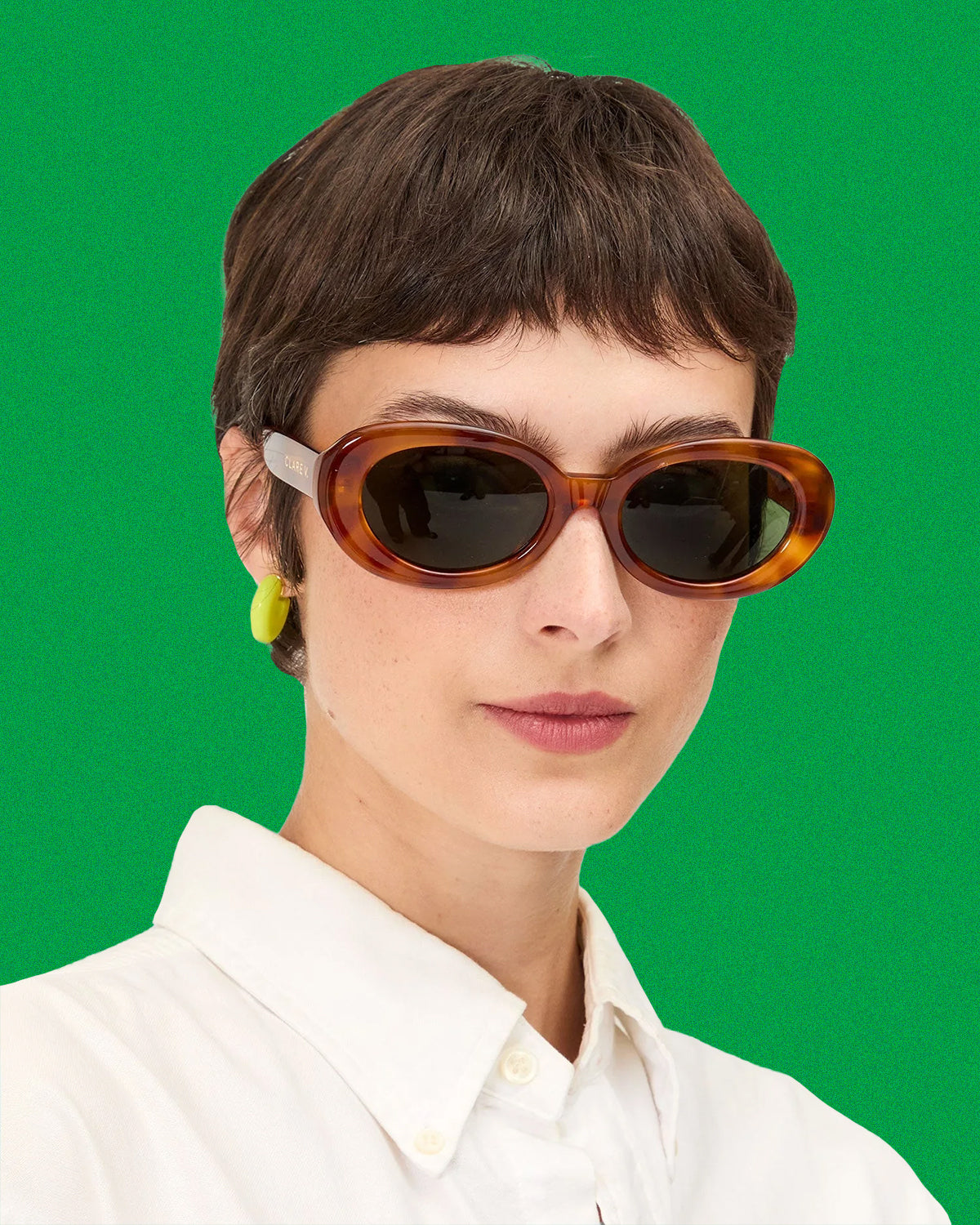 Model wearing Havana Tortoise Julia Sunglasses.