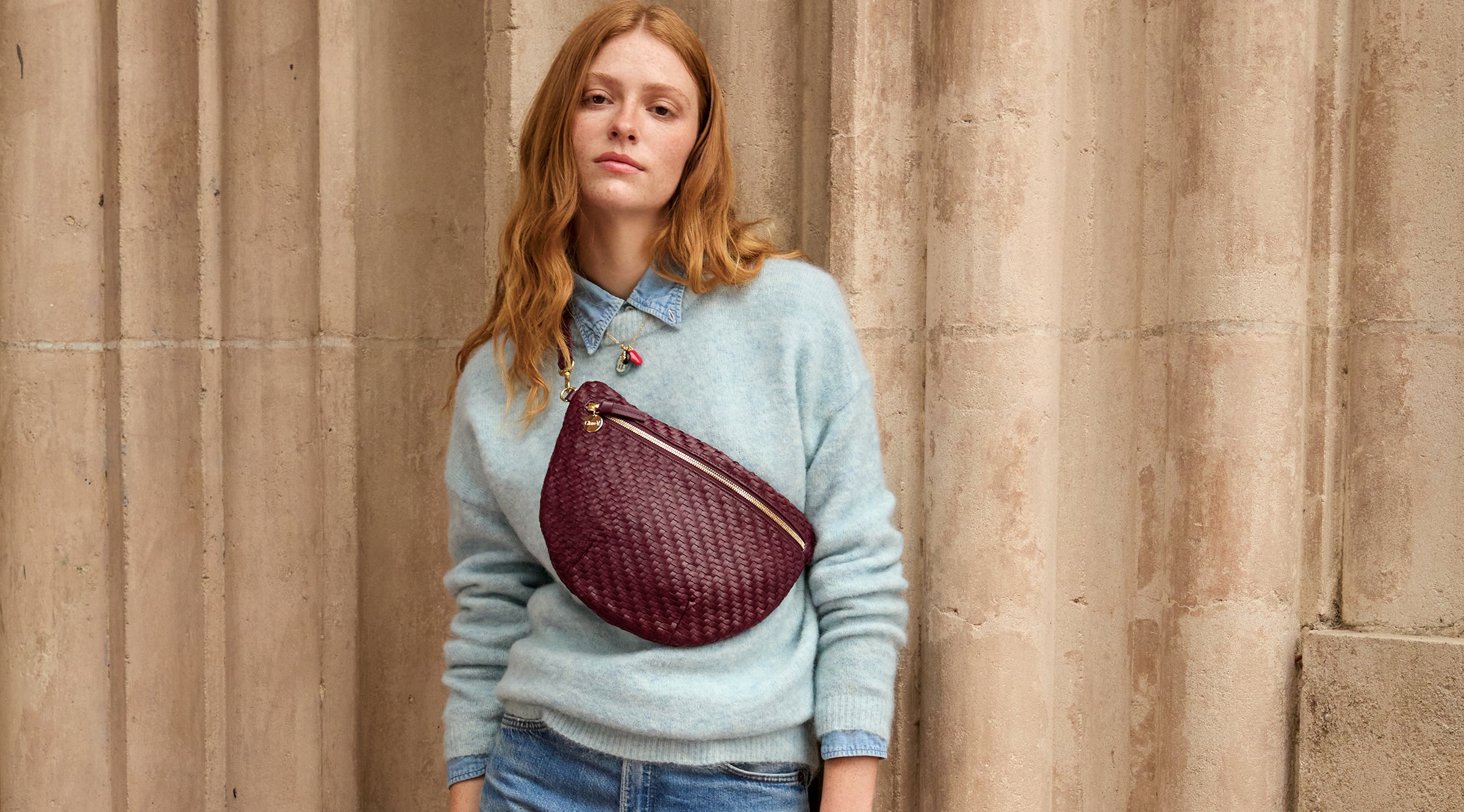 Model carrying the Cassis Woven Zig-Zag Grande Fanny.