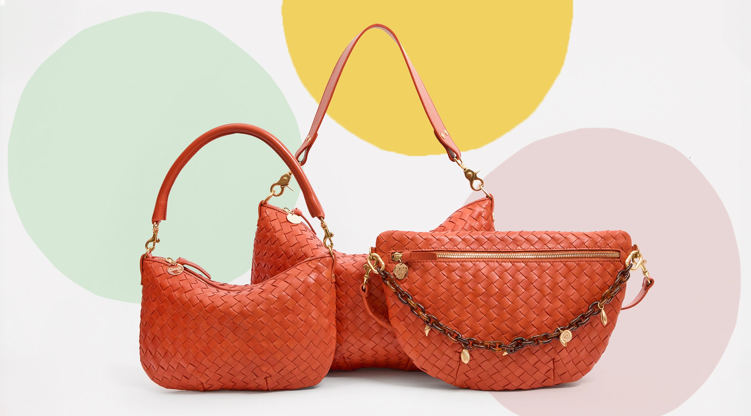 Saltillo Diagonal in Woven Grande Fanny, Moyen Messenger and Petit Moyen. The Grande Fanny has a Tortoise Resin with Sea Charms Shortie Strap attached to it.