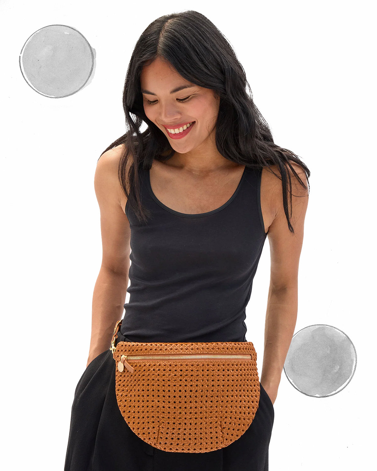 Model wearing the Tan Rattan Grande Fanny around her waist.