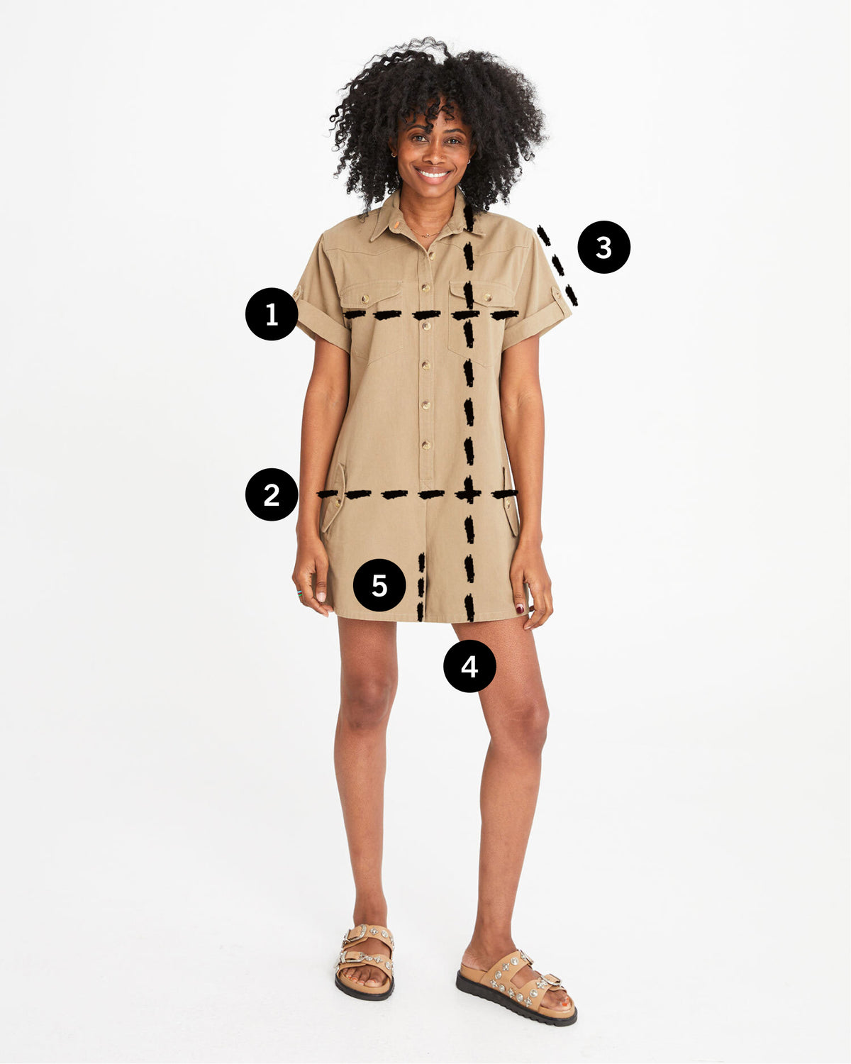 mecca wearing the jumpsuit cargo with lines showing where and how to measure the garment