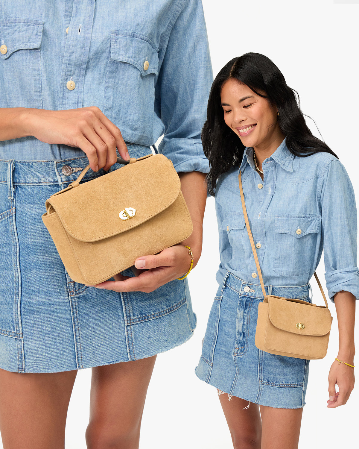 Model carrying the Dune Suede Kathryn. 