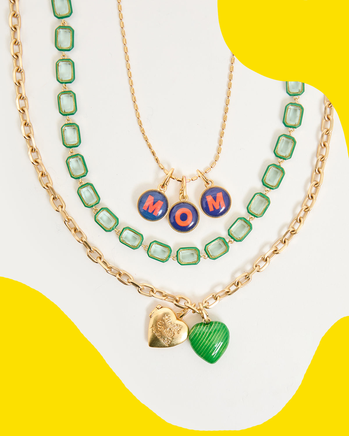 Assortment of Clare V. necklaces and jewelry charms.  