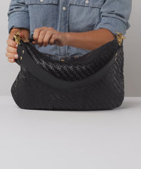 What fits inside Moyen Messenger bag