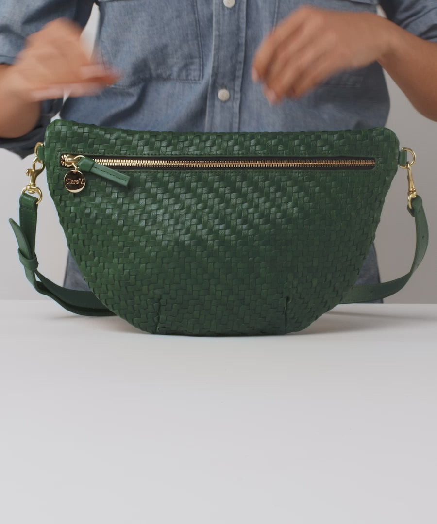 Model shows what fits in the Evergreen Zig Zag Woven Grande Fanny