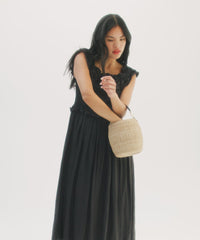 Model taking out our Tati Sunglasses from her Pot de Miel. 