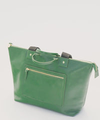 Showing Le Zip Sac on a suitcase