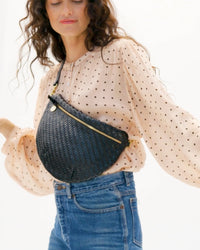 Model carrying the Black Woven Zig Zag Grande Fanny.