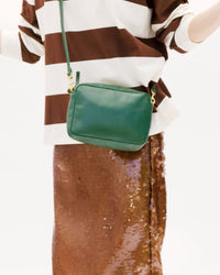 Danica dancing with her Midi Sac