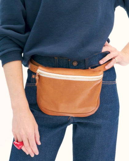 Model wearing the Tan Fanny Pack around her waist.