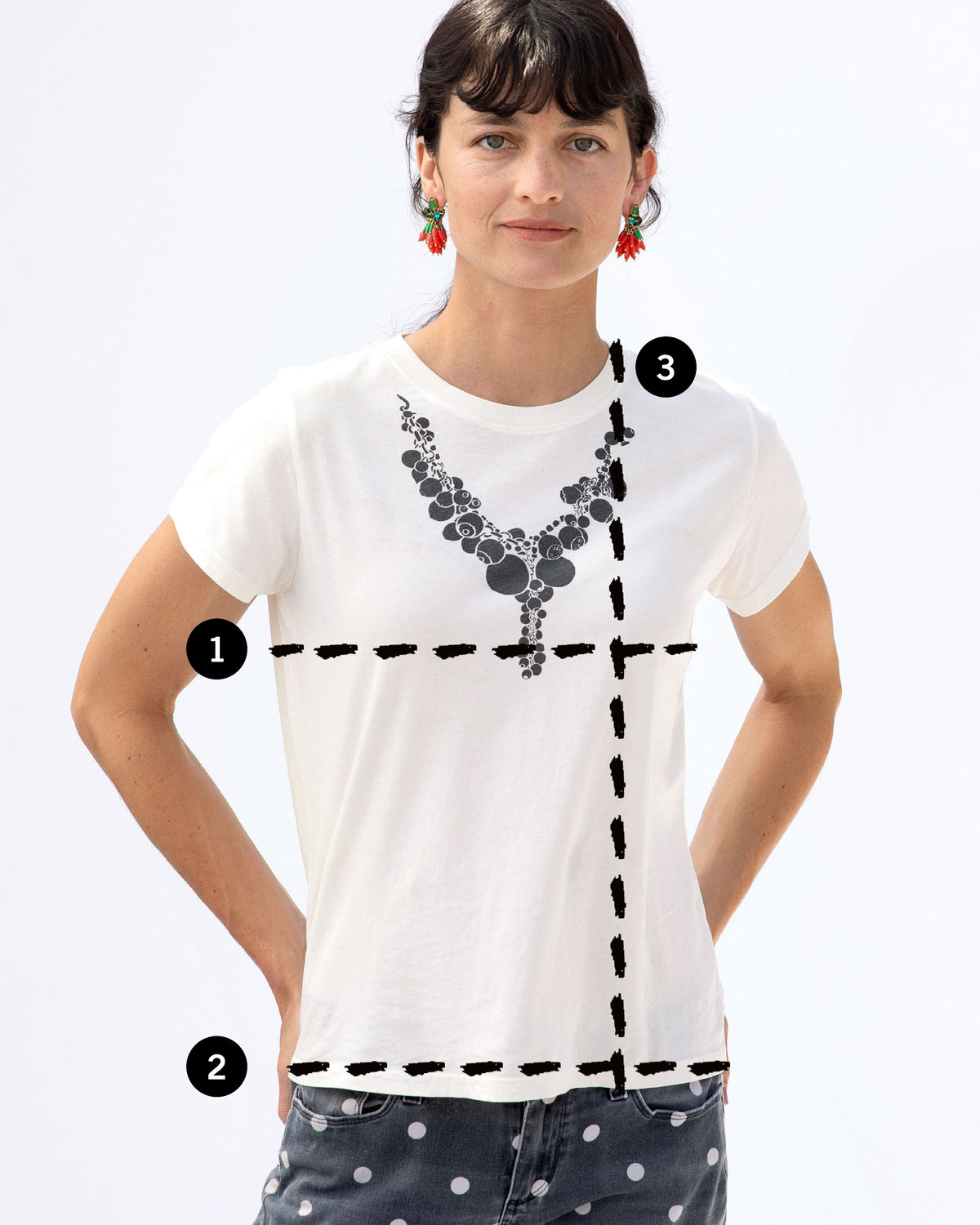 image of Danica in a white t-shirt with 3 lines depicting where the user should measure for their bust, sweep, and length measurements in comparison to the garment