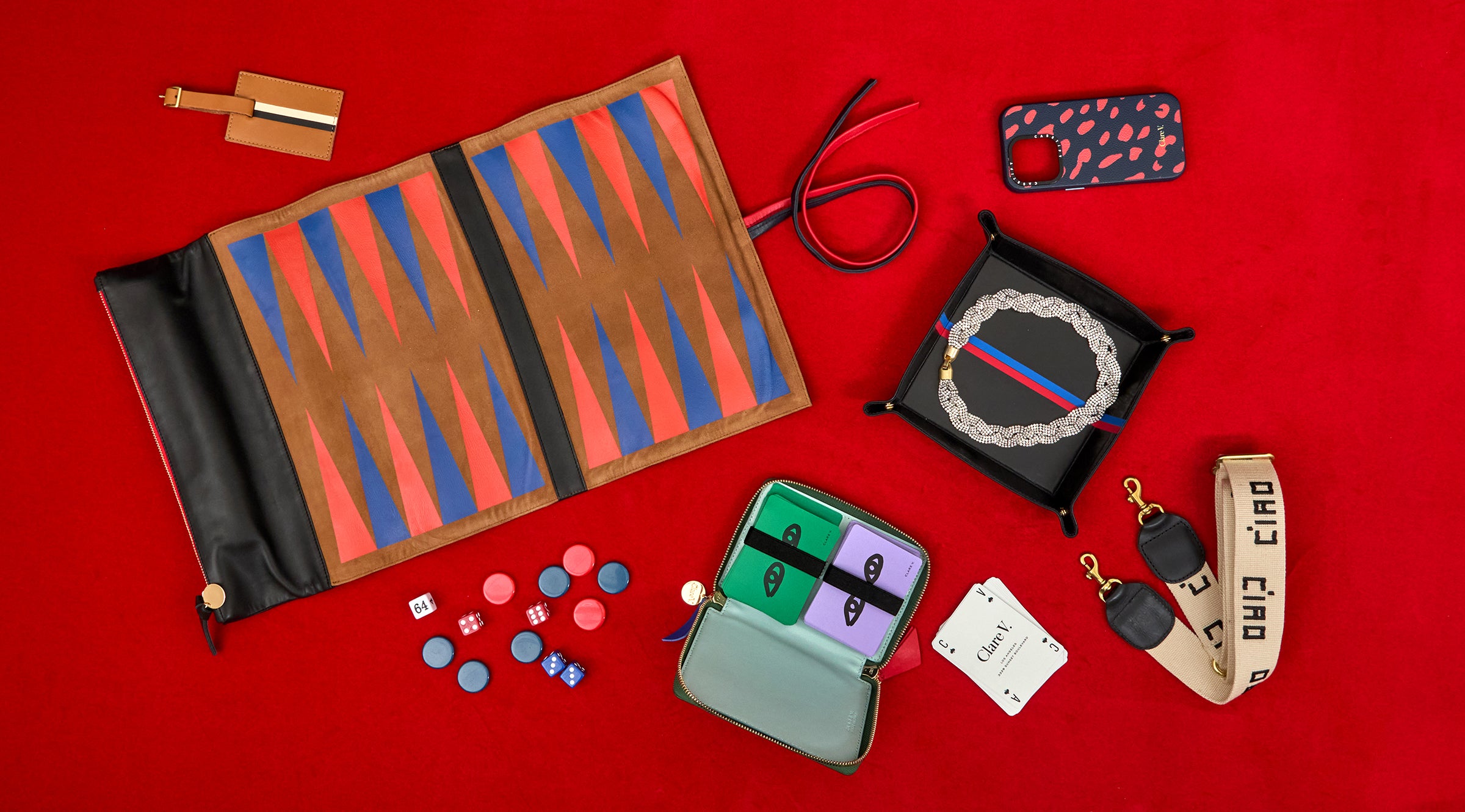 Backgammon, Luggage Tag, Les Cartes, Adjustable Crossbody Strap, Catchall, Fête Collar, and iPhone Case.