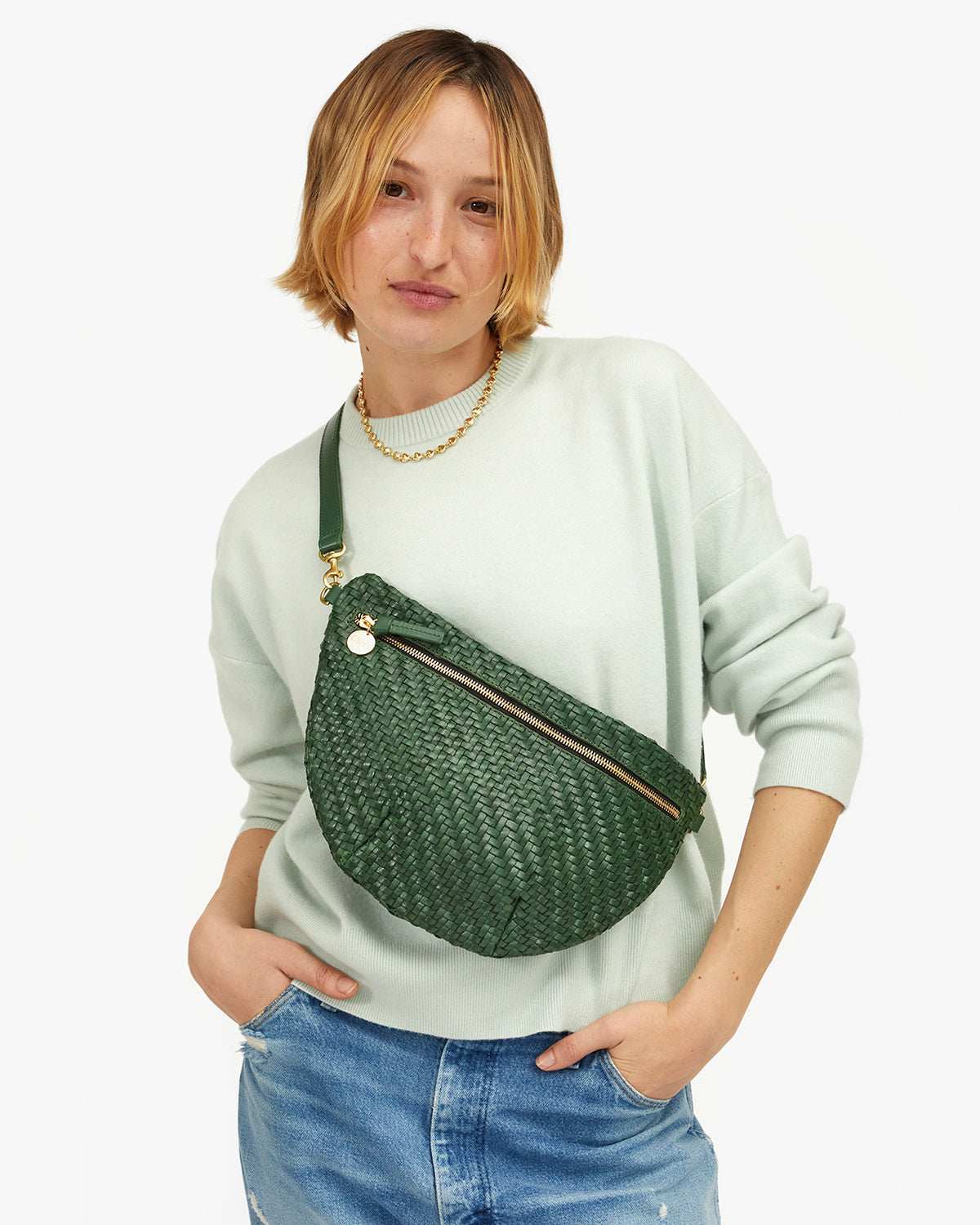 Model carrying the Evergreen Woven Grande Fanny.