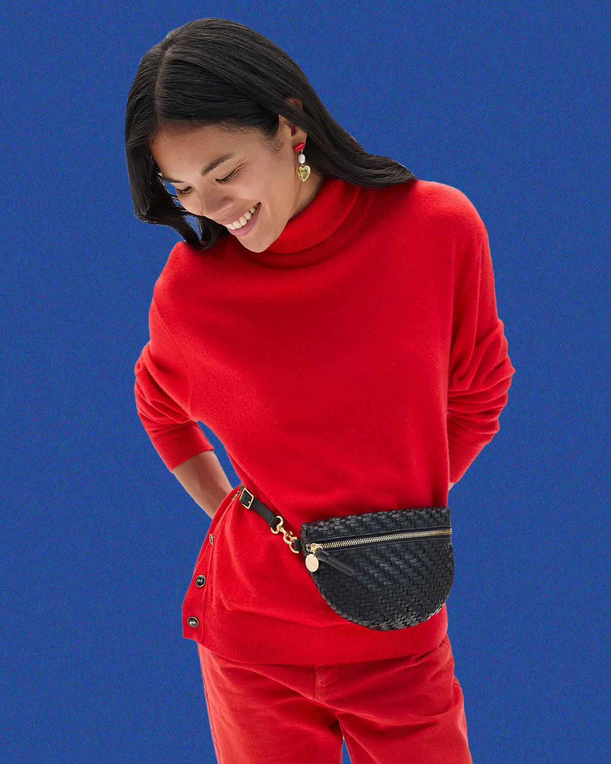 Model wearing the Black Woven Petite Fanny around her waist.