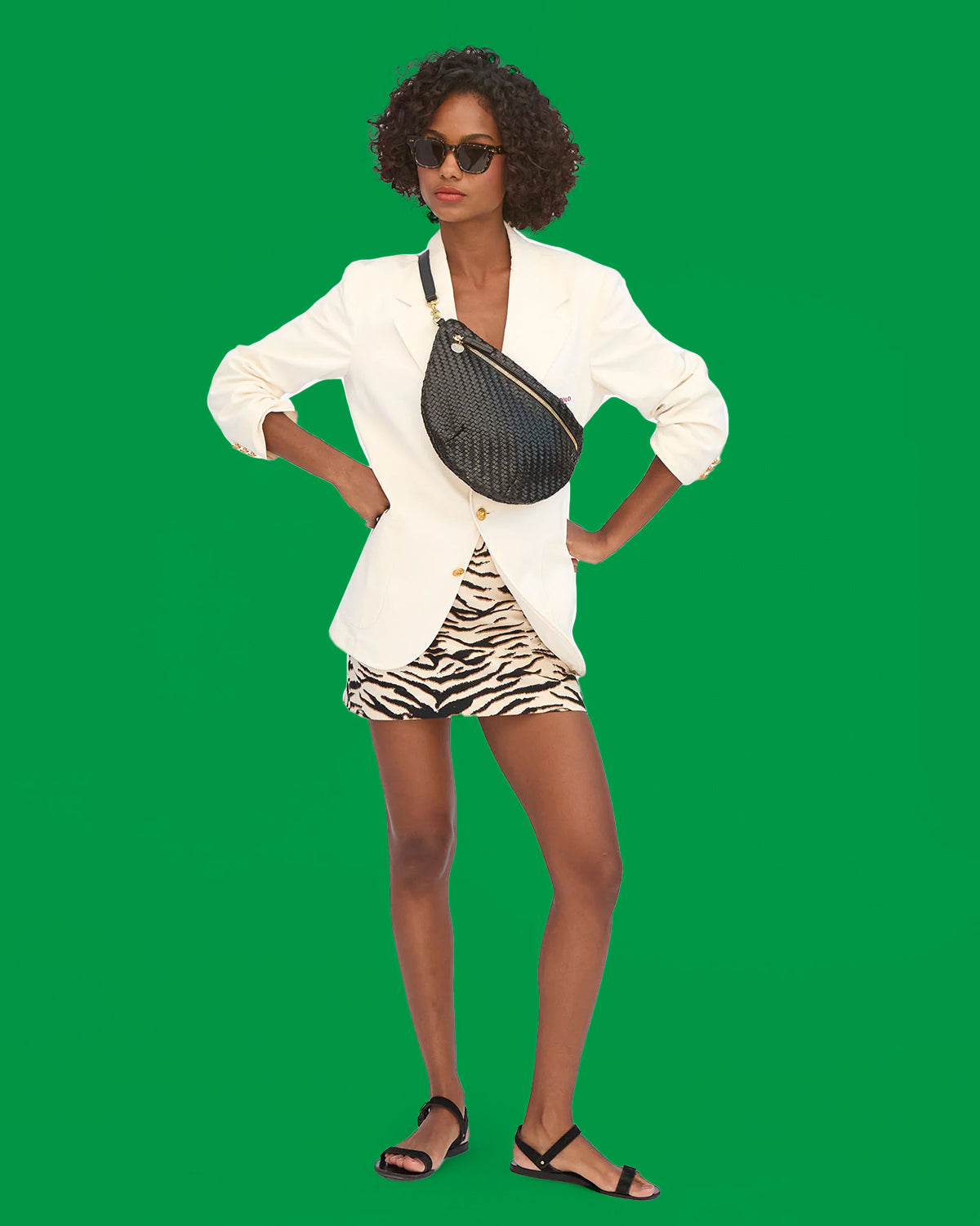 Model wearing the Black Woven Zig Zag Grande Fanny across her chest.