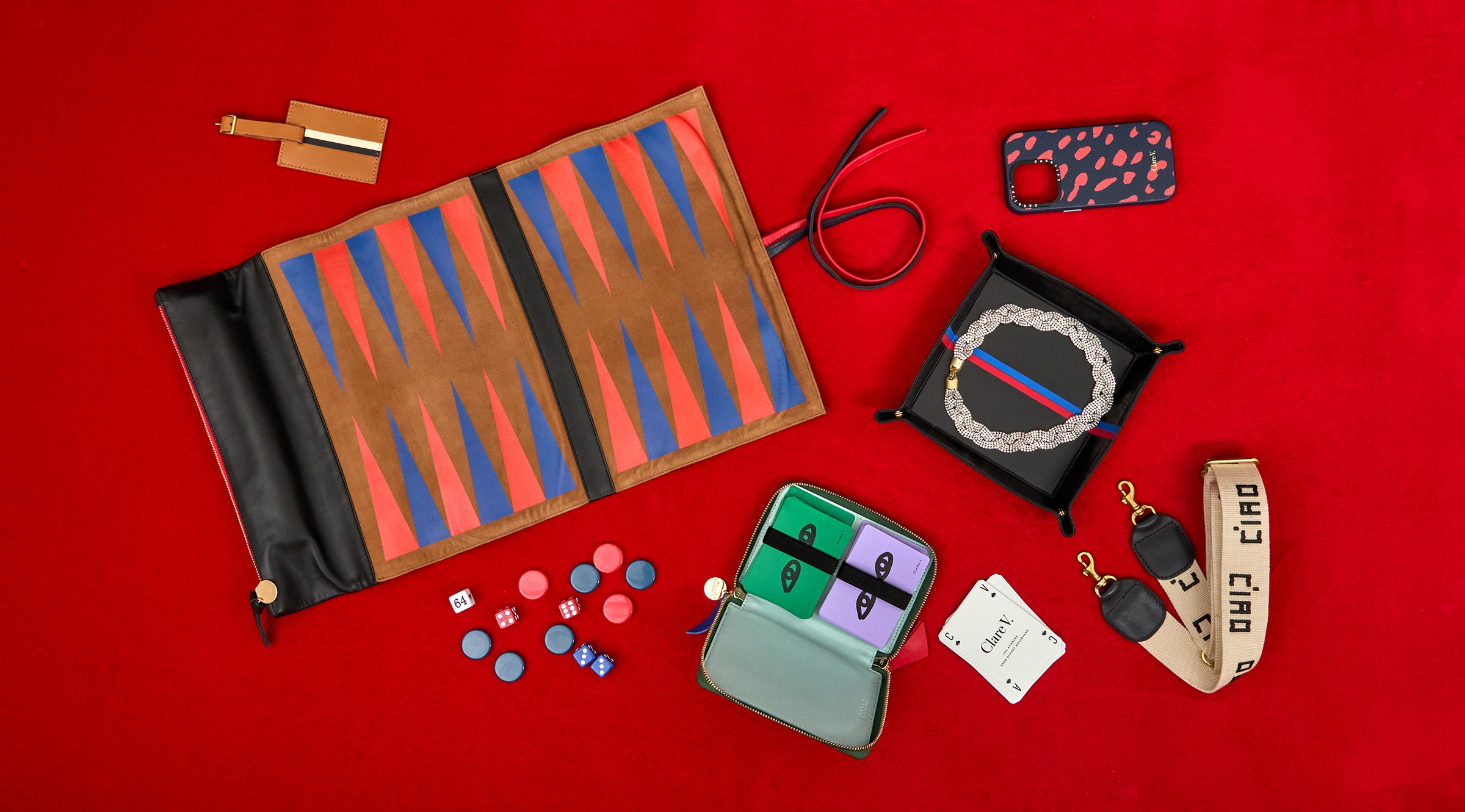 Backgammon and Les Cartes among other Clare V. accessories.