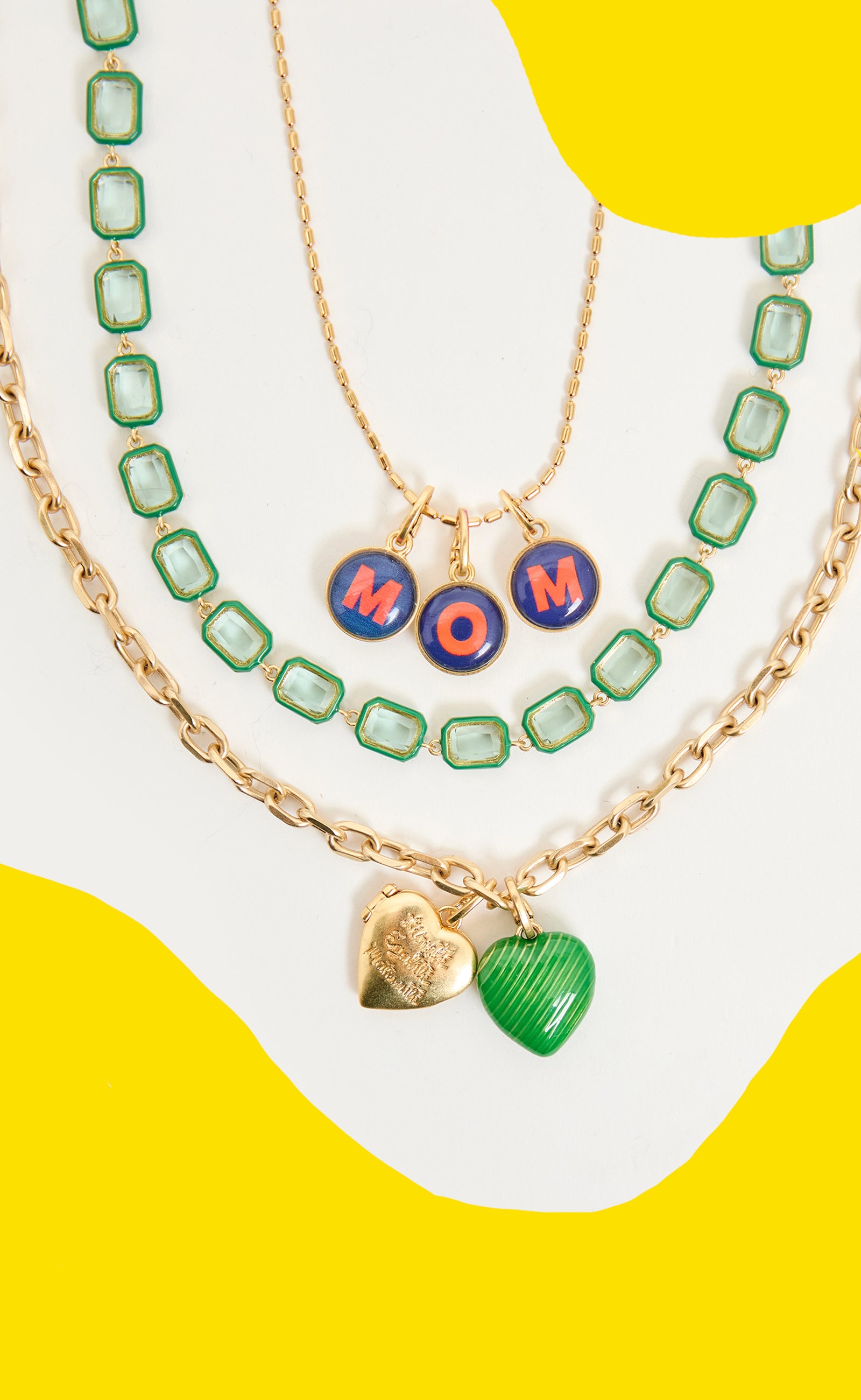 Assortment of Clare V. necklaces and jewelry charms.  