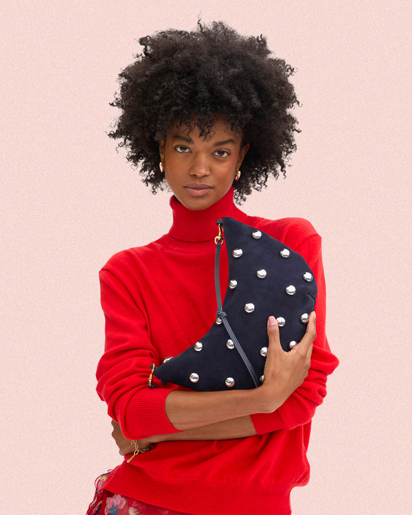 Model carrying the Navy with Studs Lune.