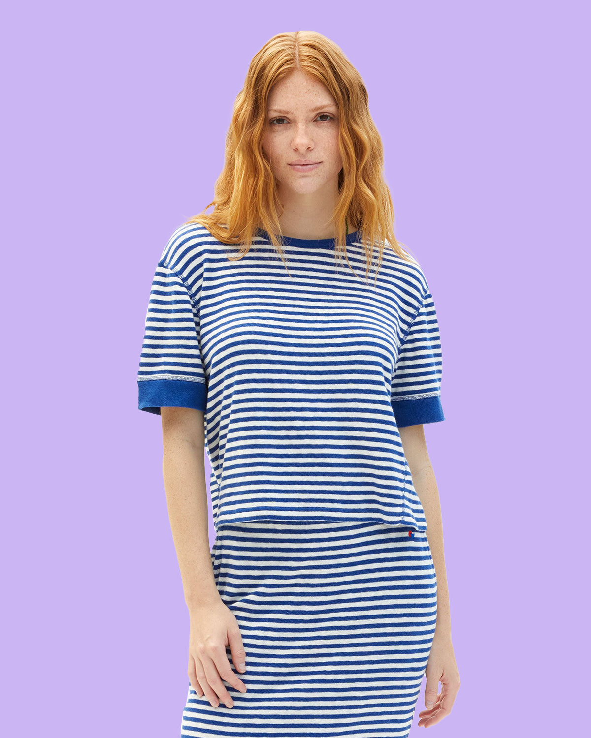 Model wearing the Cobalt and Cream Le Bateau Tee with matching skirt.