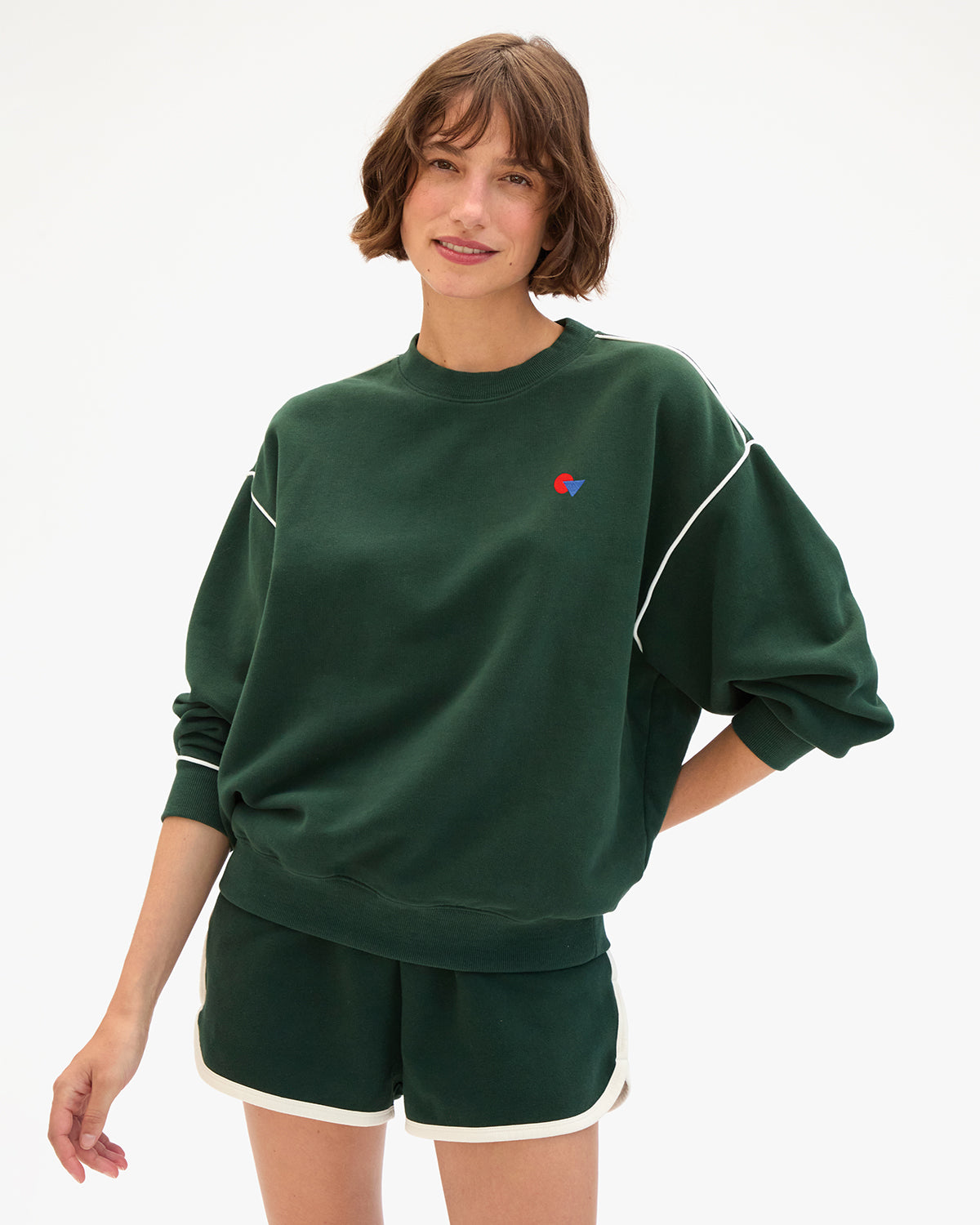 Model wearing the Deep Forest Oversized Sweatshirt and matching Le Jogging Short. 