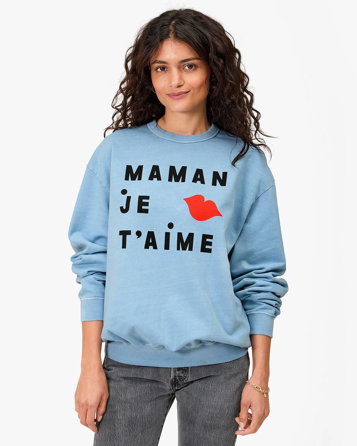 Model wearing the Light Sunfaded Blue Maman Je T'aime Oversized Sweatshirt.