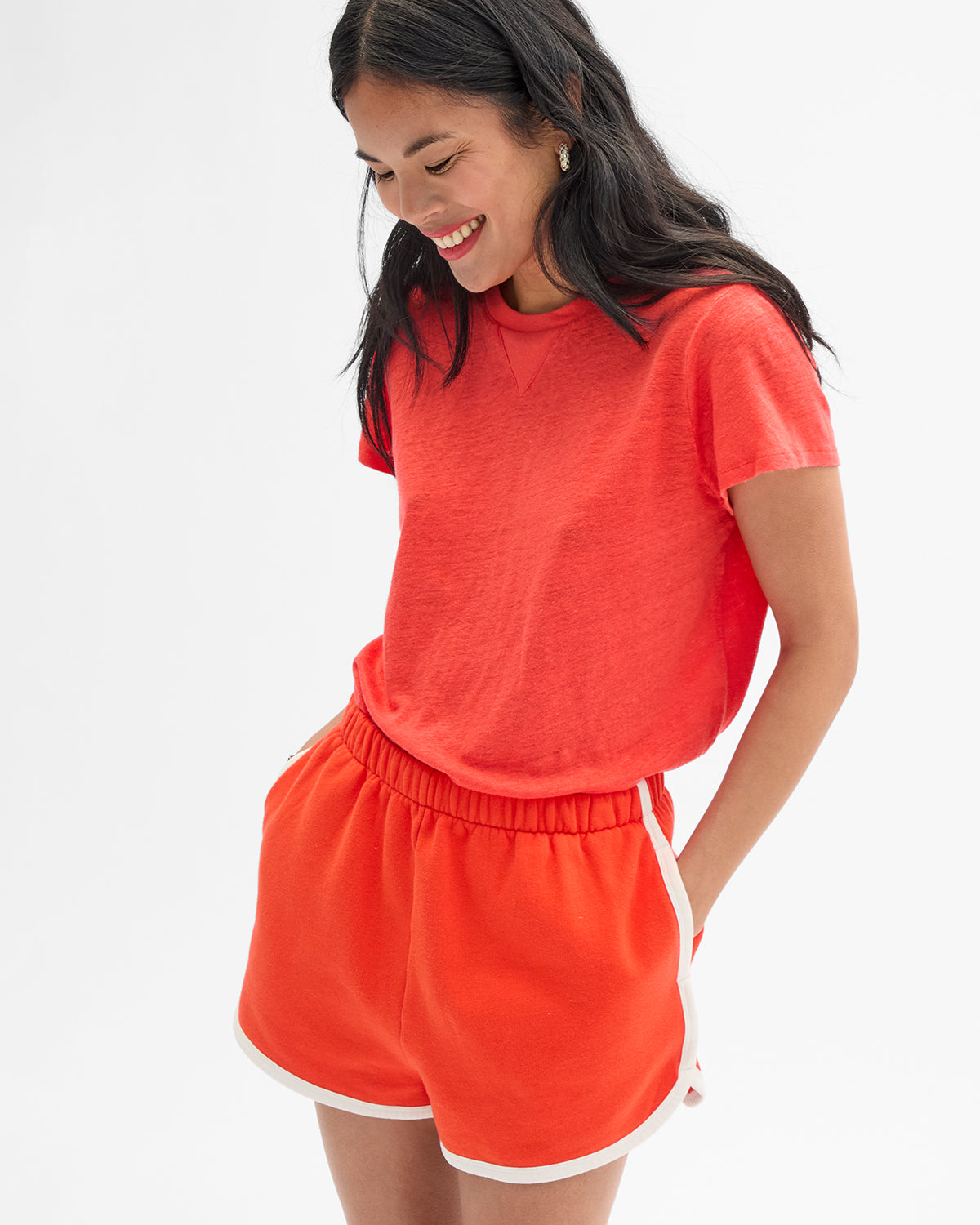 Model wearing the Bright Poppy Classic Tee with L'Orange Jogging Short. 