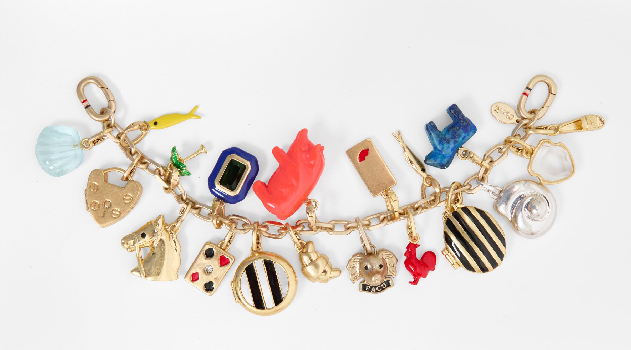 Charm Bracelet full of an assortment of Clare V. charms. 