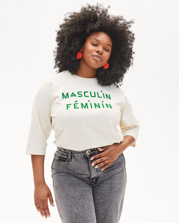 Candace in the Mecca wearing the Cream with Green Masculin Feminin Baseball Tee and jeans and the Poppy flower statement earrings