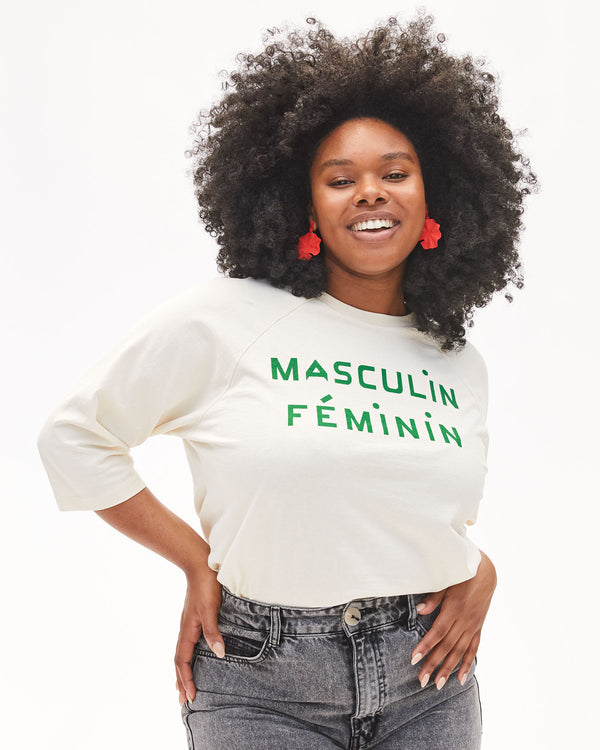 Candace is wearing the Mecca wearing the Cream with Green Masculin Feminin Baseball Tee tucked into jeans