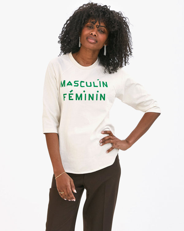 Mecca wearing the Cream with Green Masculin Feminin Baseball Tee with her hand on her hip