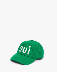 side angle of the Green Oui Baseball Hat