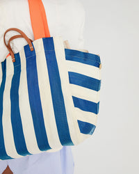 the Azul & Shell Beach Tote on mecca's shoulder