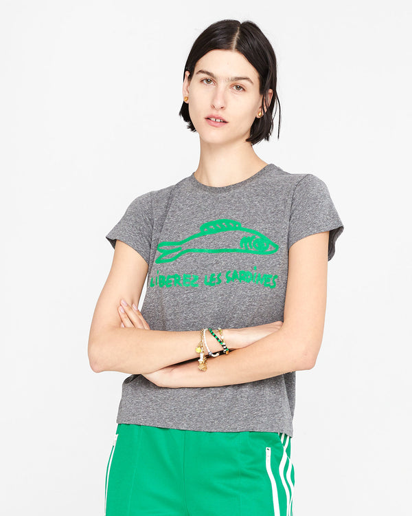 Athena wearing the Grey Liberez les Sardines Classic Tee. her arms are crossed