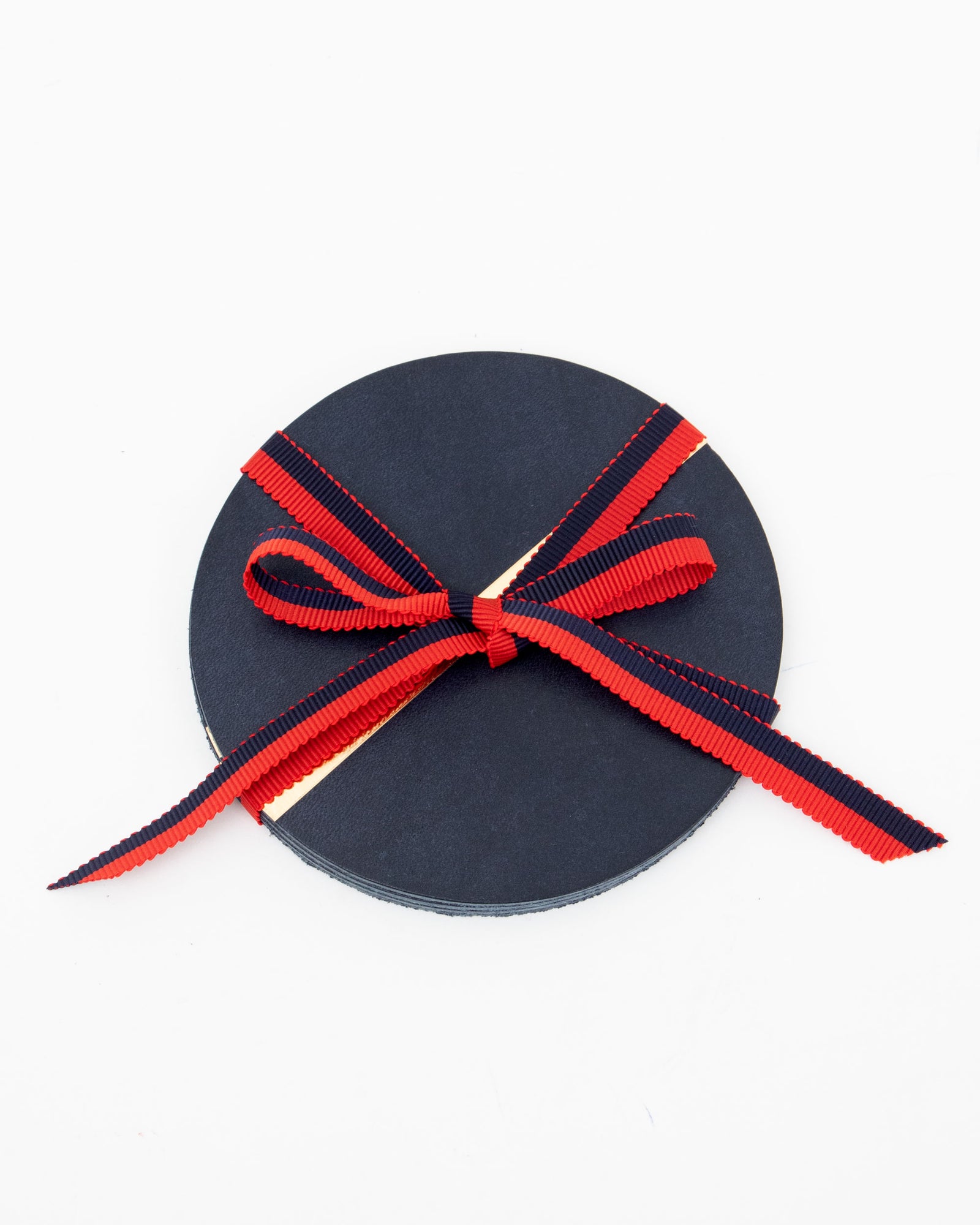 Navy w/ Gold Stripe Coasters Tied with a Navy & Red Ribbon