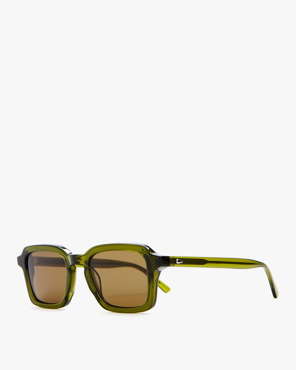 A second Side View of the Crap Eyewear Heavy Tropix Sunglasses in Olive to Show the Opacity of the Lenses